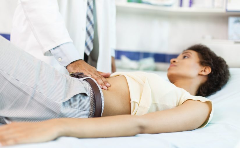 doctor examining a woman